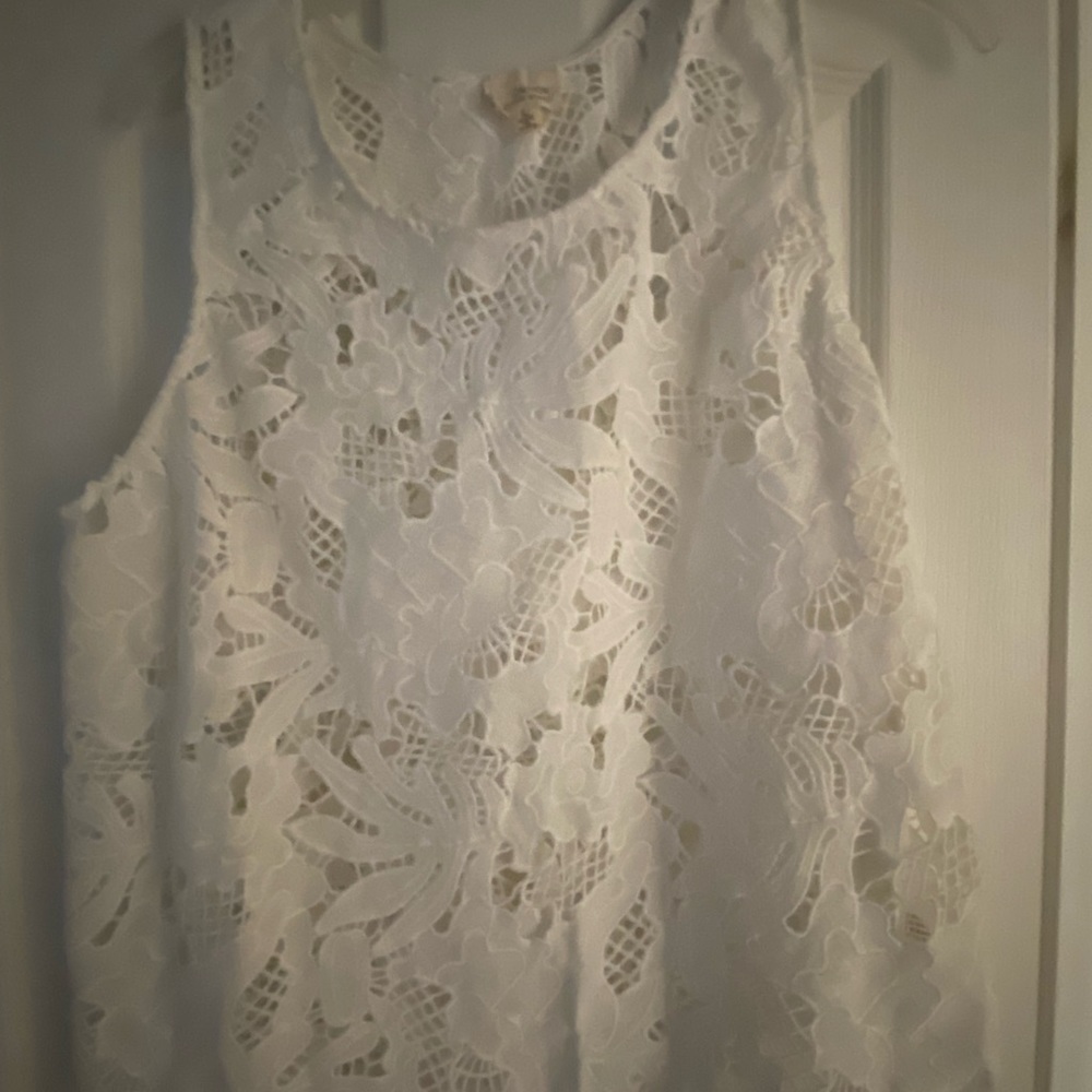 White sleeveless top